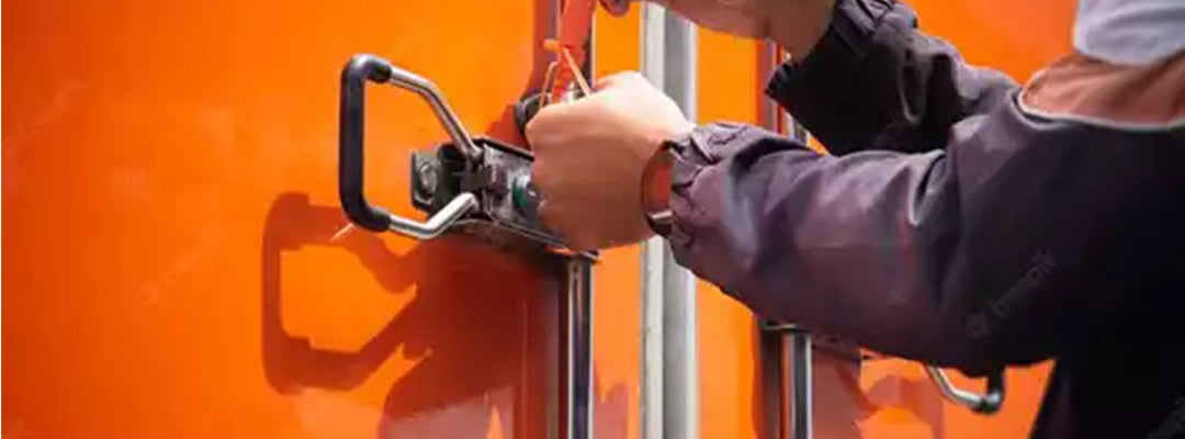 Person sealing their orange garage door